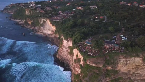 Drone view on waves and rock side at the beach 動画素材 115901092