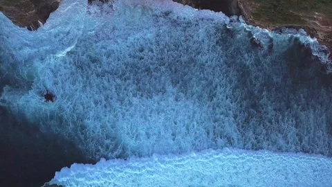 Drone view on waves and rock side at the beach Stock-Footage 115901101