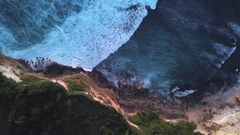 Drone view on waves and rock side at the beach Stock Footage 115901168
