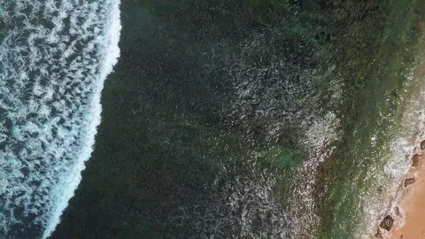 Drone view on waves at beach side Stock Footage 115900411