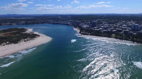 Drone view of waves at the mouth of Pumicestone Passage, Caloundra, Queensland. Stock Footage