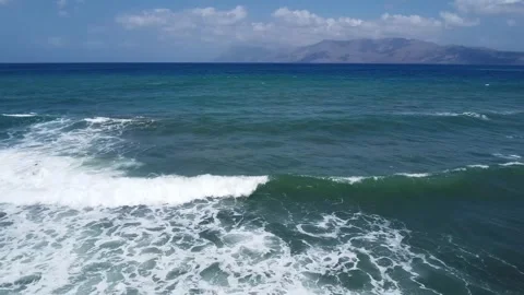 Drone View of Waves Rolling onto Sandy Beach, Crete, Greece Stock Footage 341826863