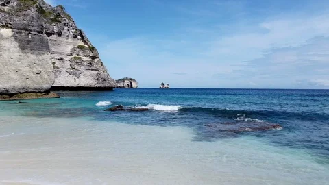 Drone View of Waves splashing on the shore of diamond beach,Indonesia Stock Footage 125843416