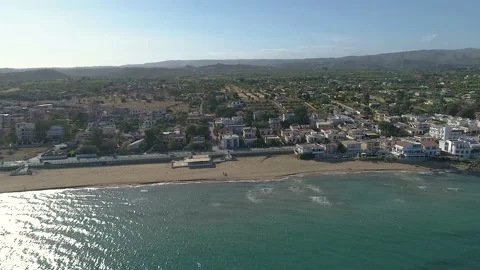 Drone view while sicilian sea waves breaking on sandy coastline, Noto, Sicily Stock Footage 179970580