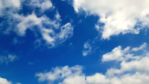Drone view white clouds and blue sunny sky loop with rays aerial shooting m.. Stock Footage 243398382