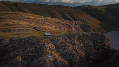Drone view of white RV camper van at mountain range Stock Footage 269802890