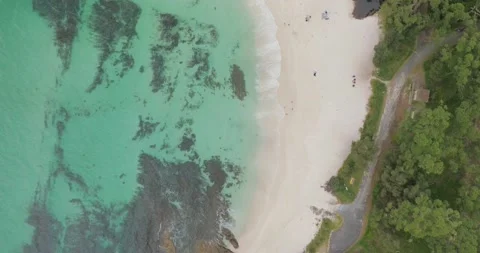 Drone view of a white sands beach with g... | Stock Video | Pond5