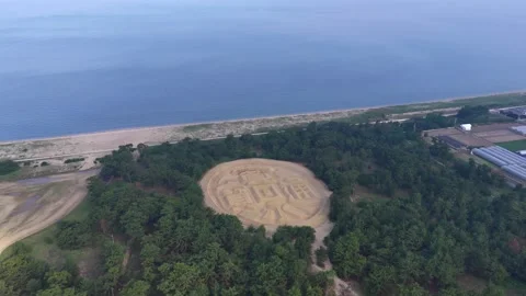 Drone View Widens Over Zenigata Sand Painting in Kanonji Stock Footage 342254813