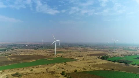 Drone View of Wind Turbines Across Agricultural Fields in Gujarat, India 03 Stock Footage 341387819