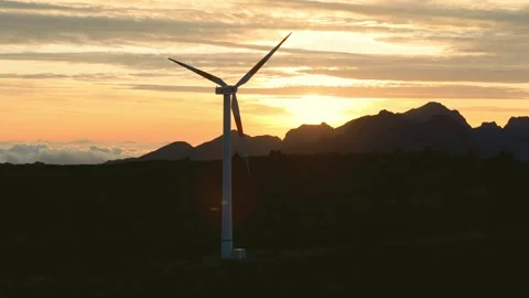 Drone view of Wind turbines in the mountains with amazing sunrise, foggy clouds Stock Footage 278717858