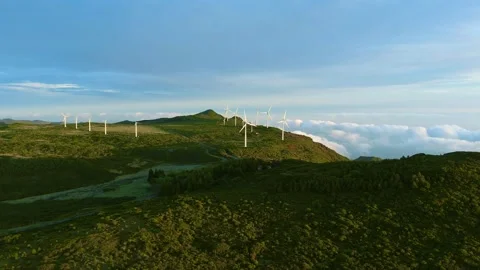Drone view of Wind turbines in the mountains with amazing sunrise, foggy clouds Stock Footage 278718090
