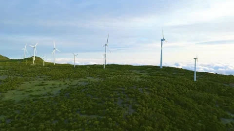Drone view of Wind turbines in the mountains with amazing sunrise, foggy clouds Stock Footage 278719078