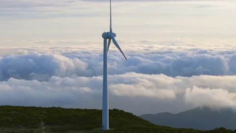 Drone view of Wind turbines in the mountains with amazing sunrise, foggy clouds Stock Footage 278720018
