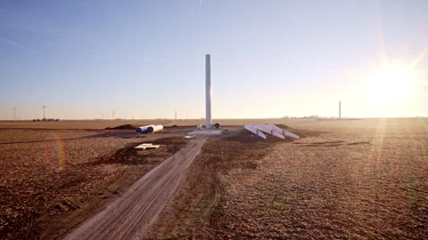 Drone view of wind turbines under construction across Midwest farmland Stock Footage 328387887