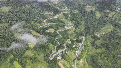 Drone view of winding snake road in Ha Giang mountains, Vietnam – 4K Stock Footage 325036232