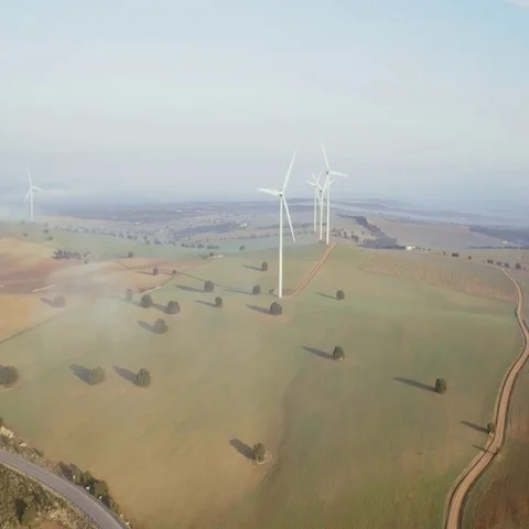 Drone view of a windmill park at sunrise Stockbeeldmateriaal 69514659