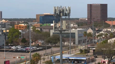 Drone View of Wireless Telecom Towers and Connectivity Infrastructure Stock Footage 330953942