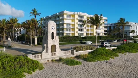 Drone view of Worth Avenue Clock Tower located in Palm Beach, Florida. Sunny day Stock Footage 275906105