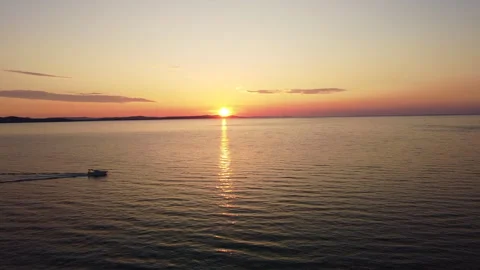 Drone View of Zadar at Sunset with Passing Boat Stock Footage 280355343