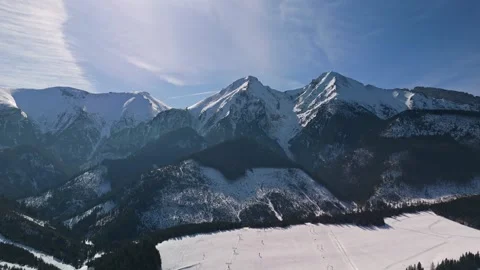 Drone view of Ždiar ski resort in the snowy High Tatras, Slovakia in winter Stock Footage 346312624