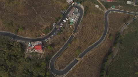 Drone view zigzag road in Mirik, North Bengal, India, at 4,905 feet. Stock Footage 341964217