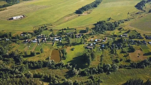Drone views over deep green forest and fields Stock Footage 105274965