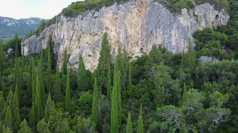 Drone views of sharp cliff and trees in Paleokastritsa area Corfu island Greece 動画素材 125930779