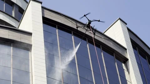 Drone is washing, cleaning windows. Stock Footage 338171908