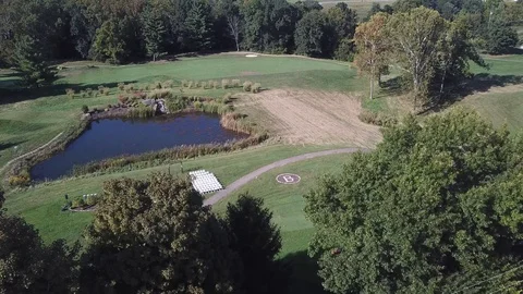 Drone Wedding Ceremony on Golf Course and a Pond Video stock 116505637