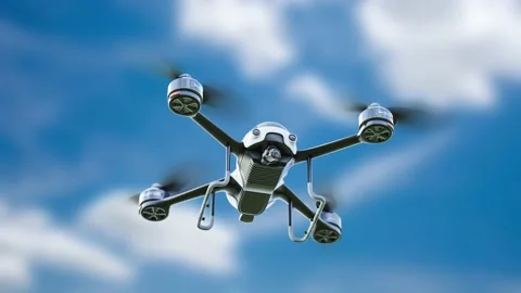 Drone white color flying close-up. taken from below while the sky is clear. Stock Footage 199733741