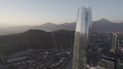 Drone Wide Orbit Shot Around Gran Torre Santiago At Sunset Stock Footage 345606390