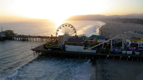 Drone Wide View Arcing Around Santa Monica Pier At Sunset 4K 24FPS Stock Footage 196122231