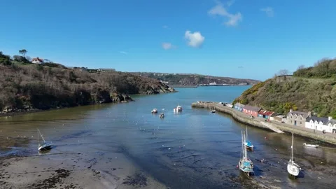 Drone Wide View Facing Sea with Boats near Fishguard Coast, Wales UK Stock-Footage 332075774