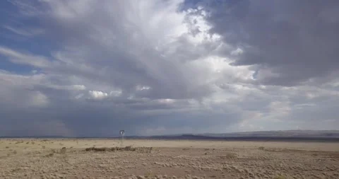 DRONE — of Windmill and Dark Sky, Texas Stock Footage 256818596