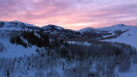 A drone of a winter sunset in the Wasatch Mountains, near Park City, Utah. Stock Footage 106474186