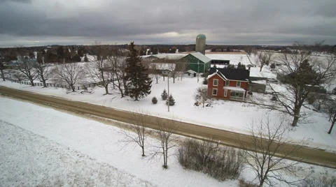 Drone: Winter - Track forward over the Family Farm Stock Footage 61375132