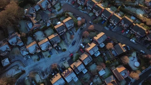 Drone - Winter - UK slow top down shot to tilt into sun Stock Footage 325976185