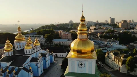 Drone wraps around Golden Dome of St. Michael's Golden-Domed Monastery on Stock Footage 201435892