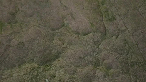 Drone zenith view of land and rocks Cooper Hills Waterford Coast Ireland. Tra na Vídeos de archivo 242190992