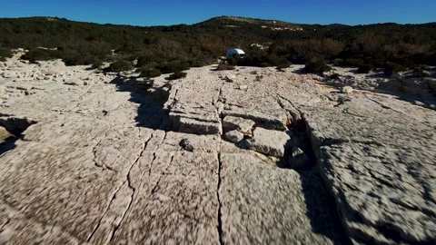 Drone zoom out shot of 2 people sitting together and enjoying a meal on Stock Footage 169000371