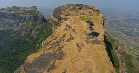 Drone zoom in shot of ancient structure on top of mountain Stock Footage 117023536