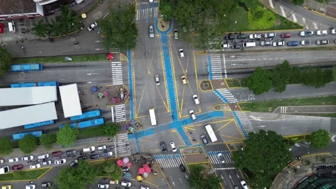 Drone Zoom In on Urban Road Intersection and Traffic Infrastructure Stock Footage 307974174