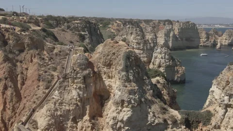 Drone/Aerial Shot of Ponta da Piedade in Lagos, Portugal. Miradouro da Ponta da  Stock Footage 224968340