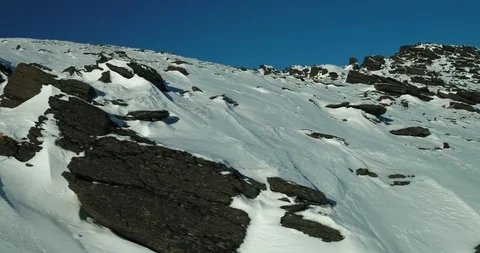 Dronemoving right on a snow covered mountain. 4K 50p 스톡 동영상 88115944