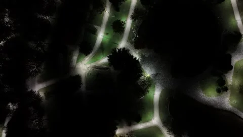 A Drone's Aerial Perspective Over Winding Luminous Paths Stock Footage 314072796