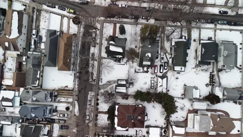 Drone's aerial top down perspective flying over a quiet suburban american Stock Footage 331087262