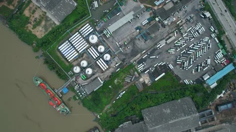 Drones are flying over a gas tanker docked in port Stock Footage 210773835