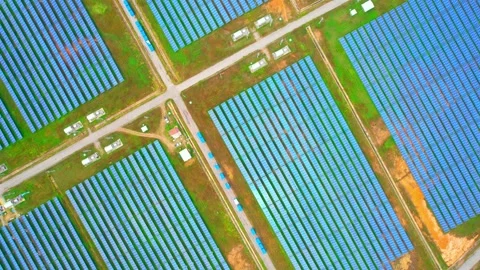 Drones are flying over solar cells Stock Footage 225385907