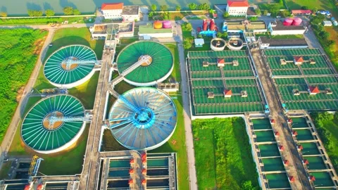 Drones are flying over water treatment plants for city Stock Footage 225390974