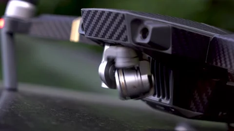 The drone's camera is calibrated before takeoff. Stock Footage 157319087